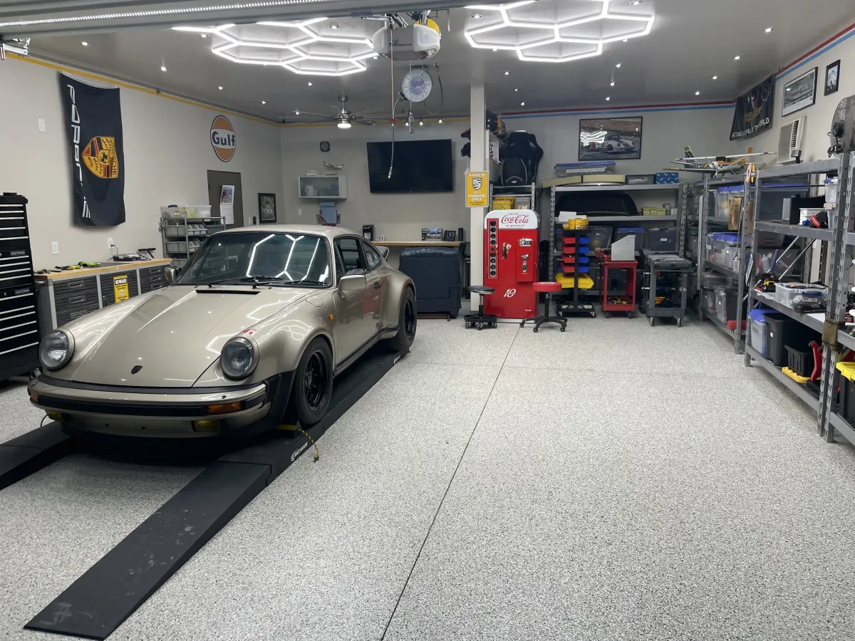 Porsche 911 parked on a flake epoxy coated garage floor in Oklahoma City